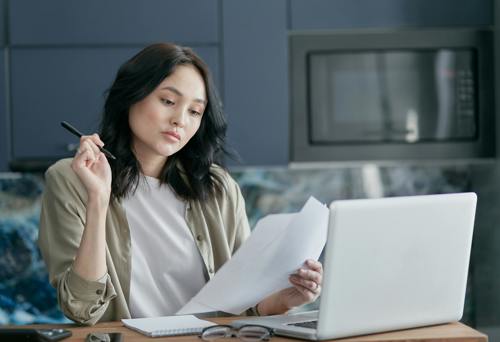 lady looking at paperwork